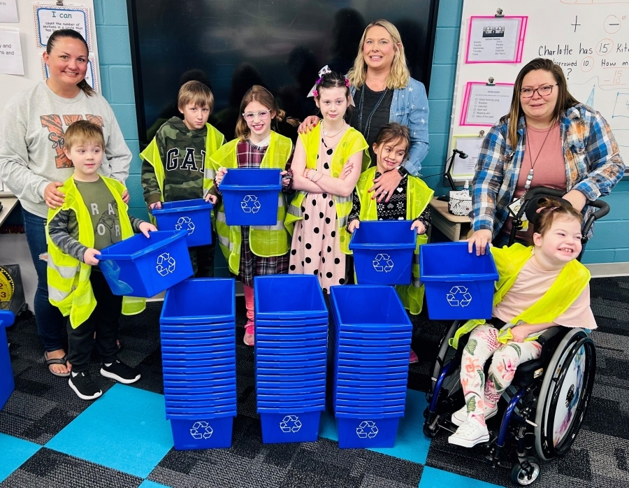 Students with recycle bins